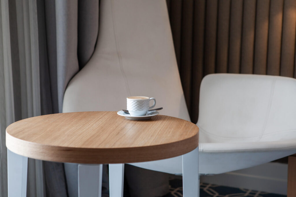 A sideview of the coffee table with a coffee on it - Built by Fox in the Sawdust in Rexburg ID coffee table build